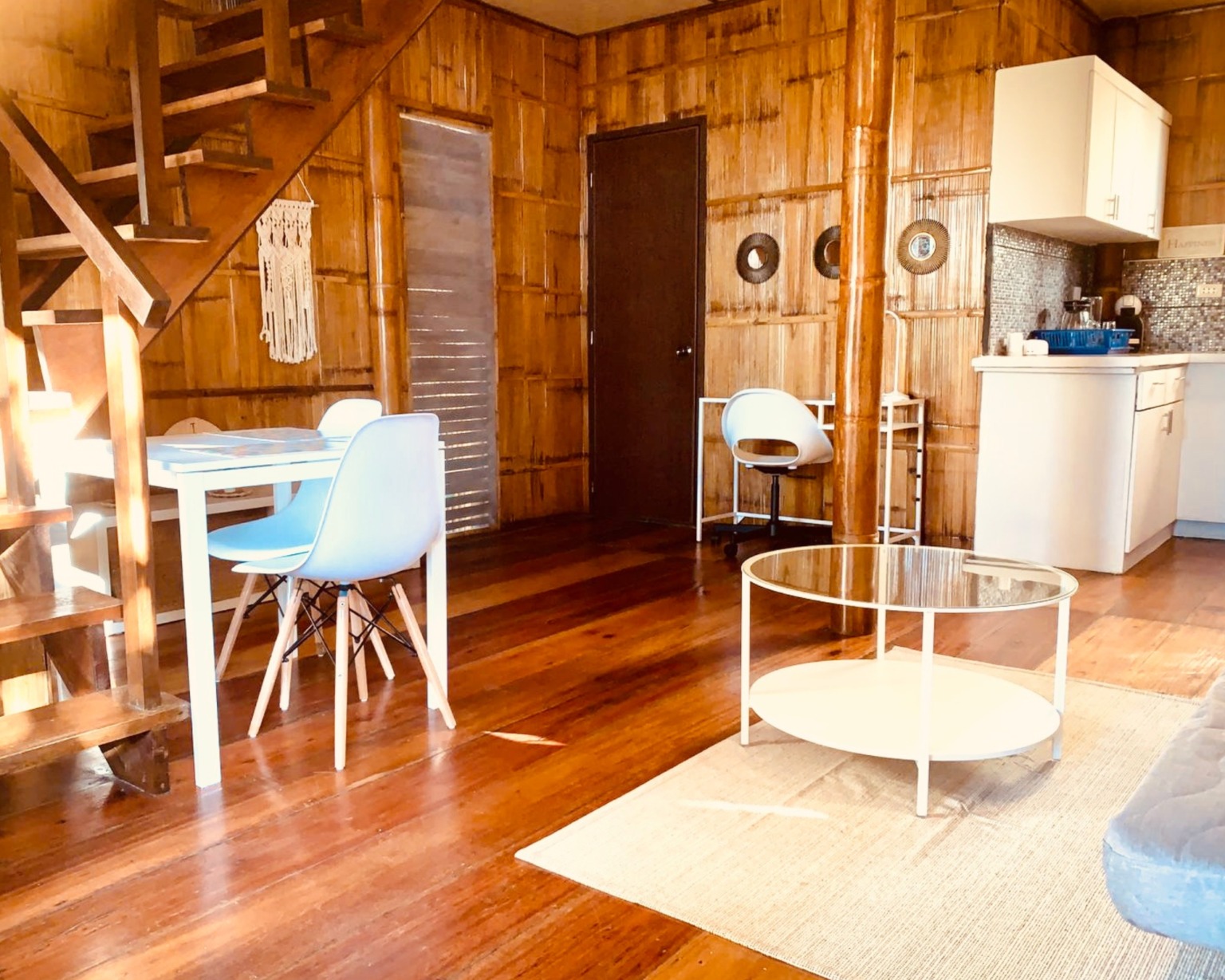 Image showcasing a cozy, inviting living room at BlissBamboo Homestay on Siargao, perfect for unwinding after a day of island exploration.